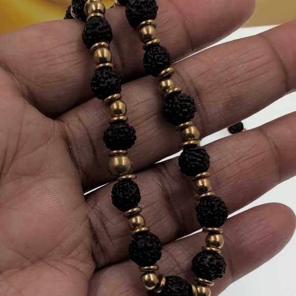 Nataraj Elegant Gold and Black Necklace with Circular Pendant - Picture 3 of 6